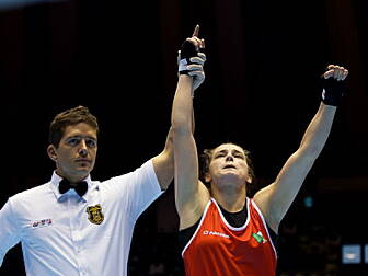 Katie into final after tough b...